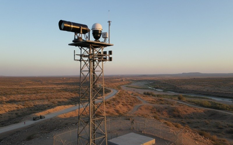 Long range surveillance camera system mounted on a tower